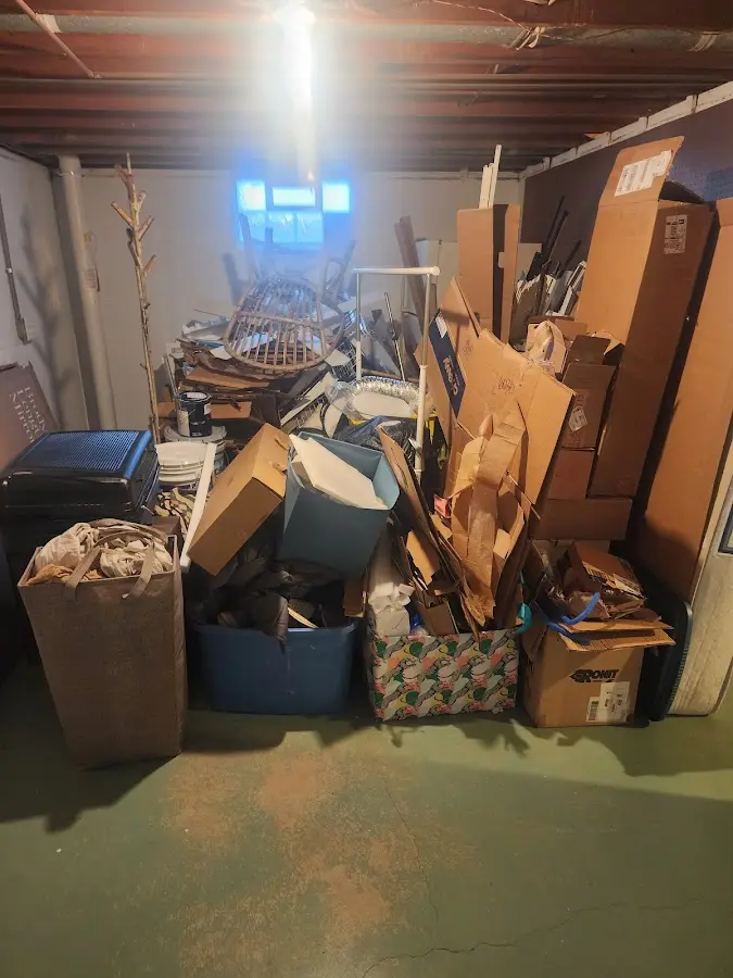 Roll-off dumpster container at job site for Roll Off Dumpster Rental in Monroe